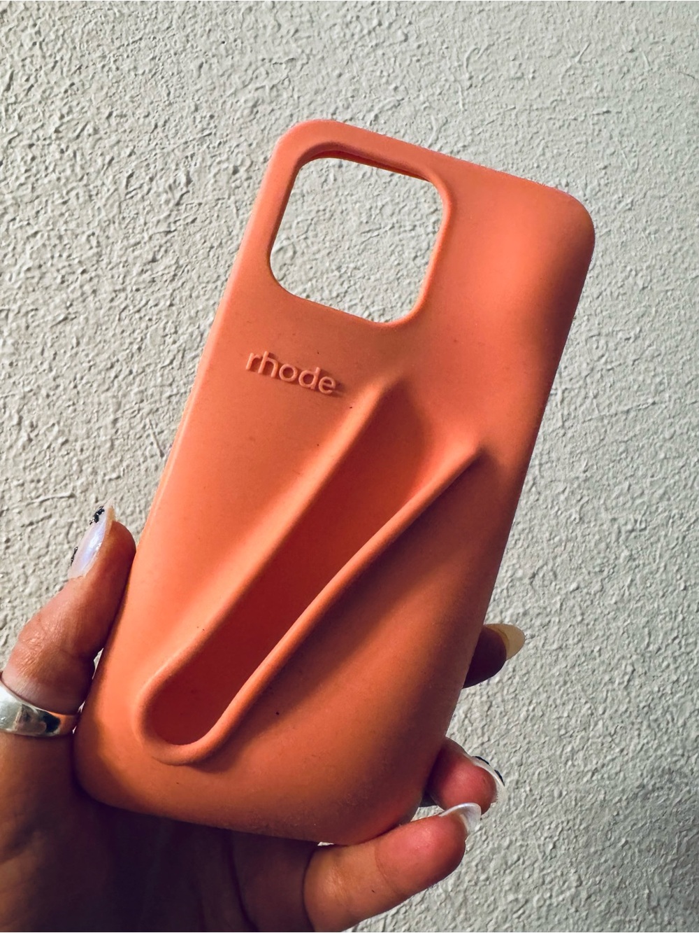 RHODE Coral-Orange Silicone Phone Case with Built-In Grip
